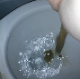 One of our users records his large wife taking a soft, runny shit into a toilet. She spreads her ass cheeks to show us the mess on her butt, and finished mess in toilet bowl is shown. About a minute.
